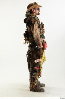  Ryan Miles in Junk Town Postapocalyptic Bobby Suit holding gun standing whole body 0007.jpg
